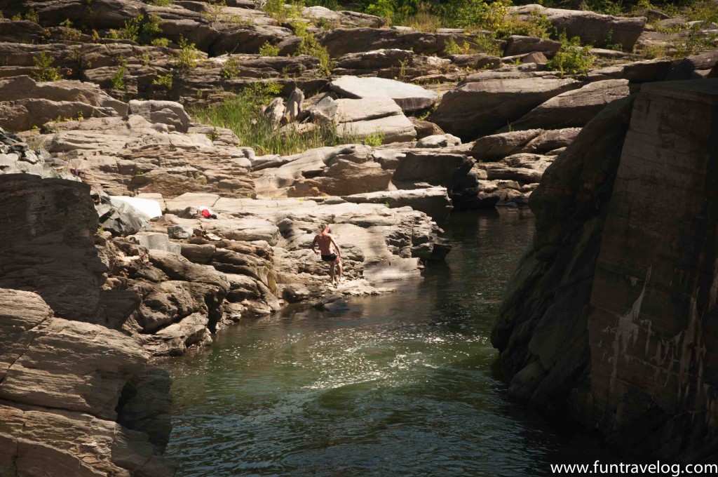 Cliff jumping outside Simon Pearce Glass Factory in Vermont