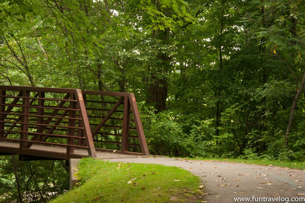 A small bridge leading to a corn field in Vermont